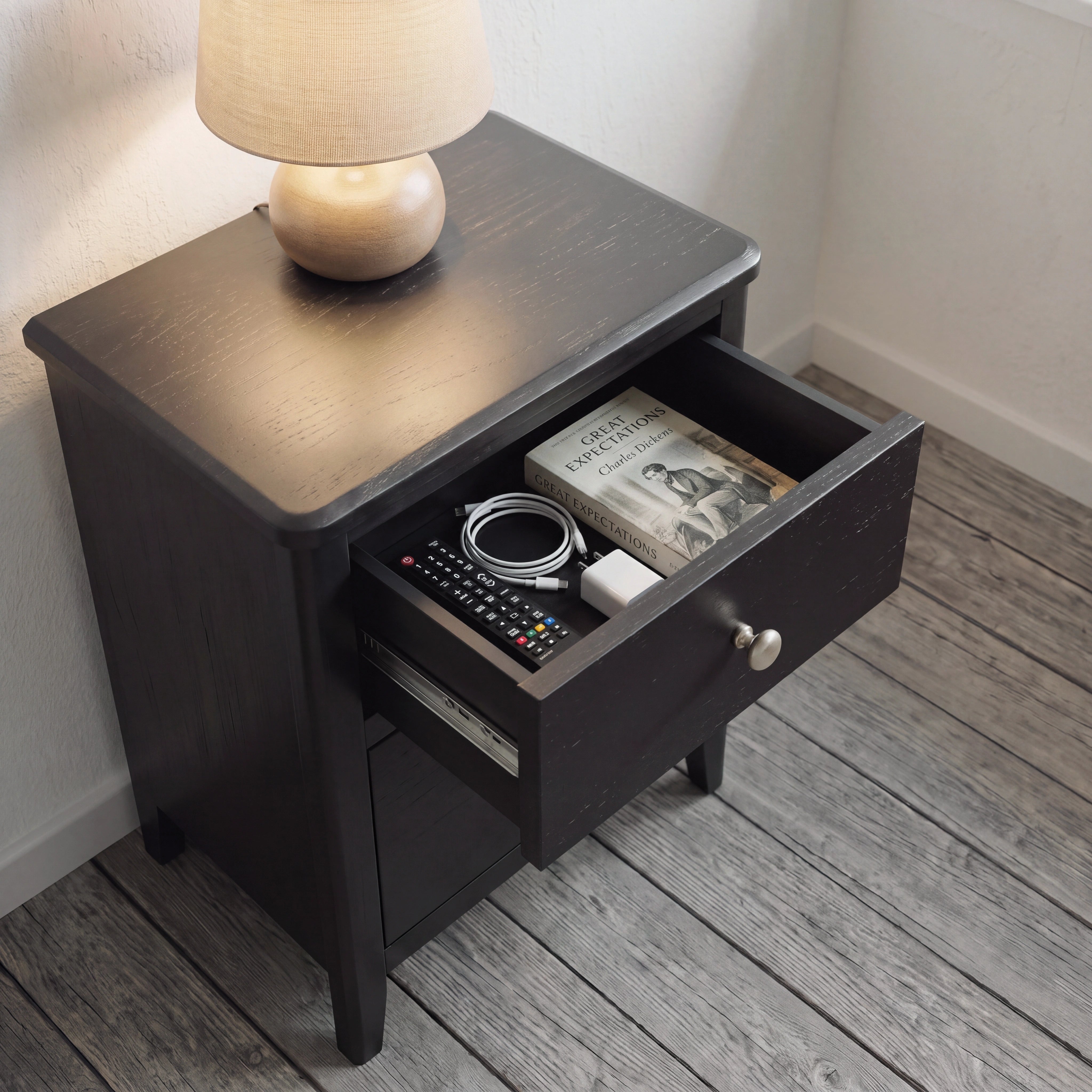 Alvar Black Two Drawer Bedside Table with gold handles and raised base
