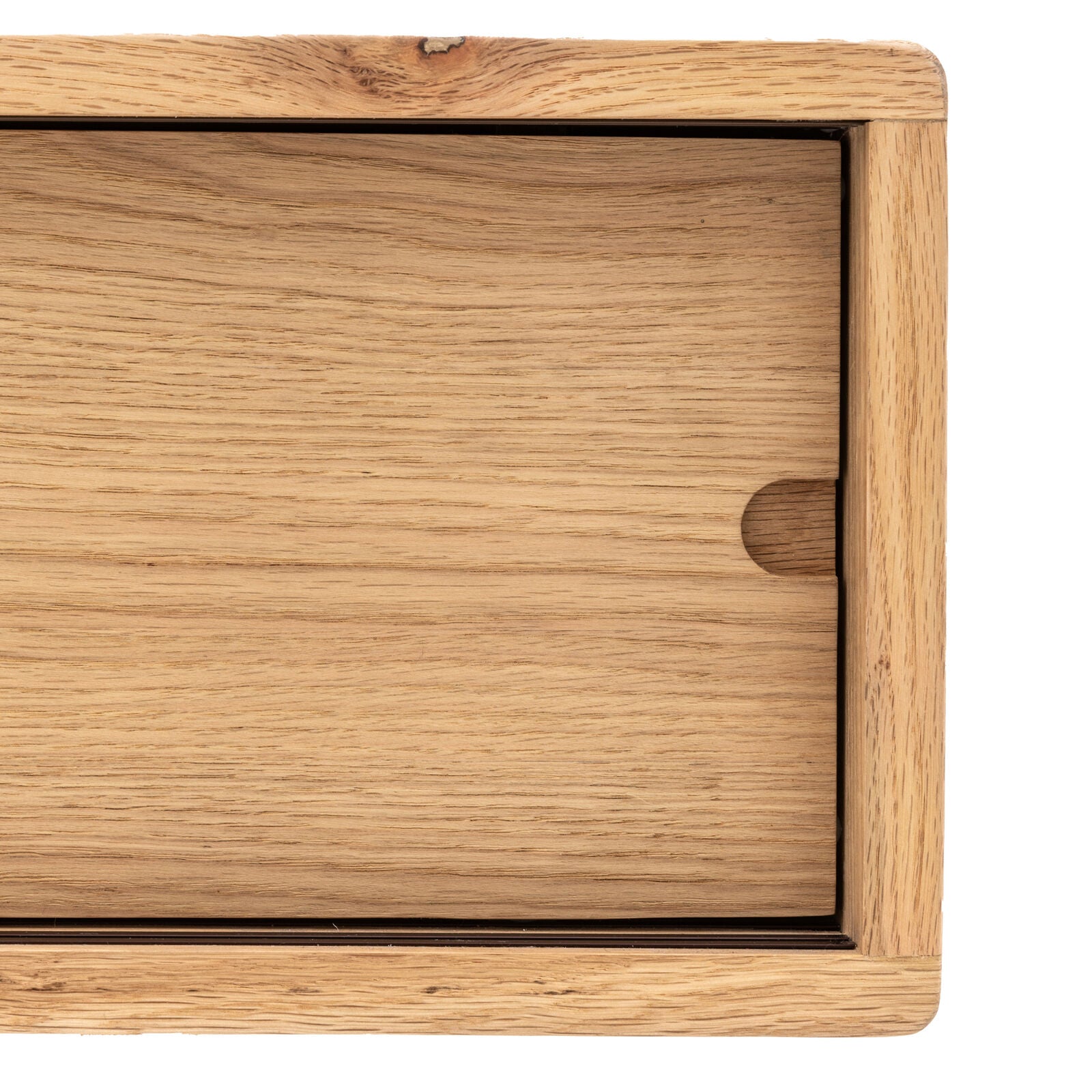 Artisan oak media unit with sliding doors and shaped underframe in natural finish | malletandplane.com