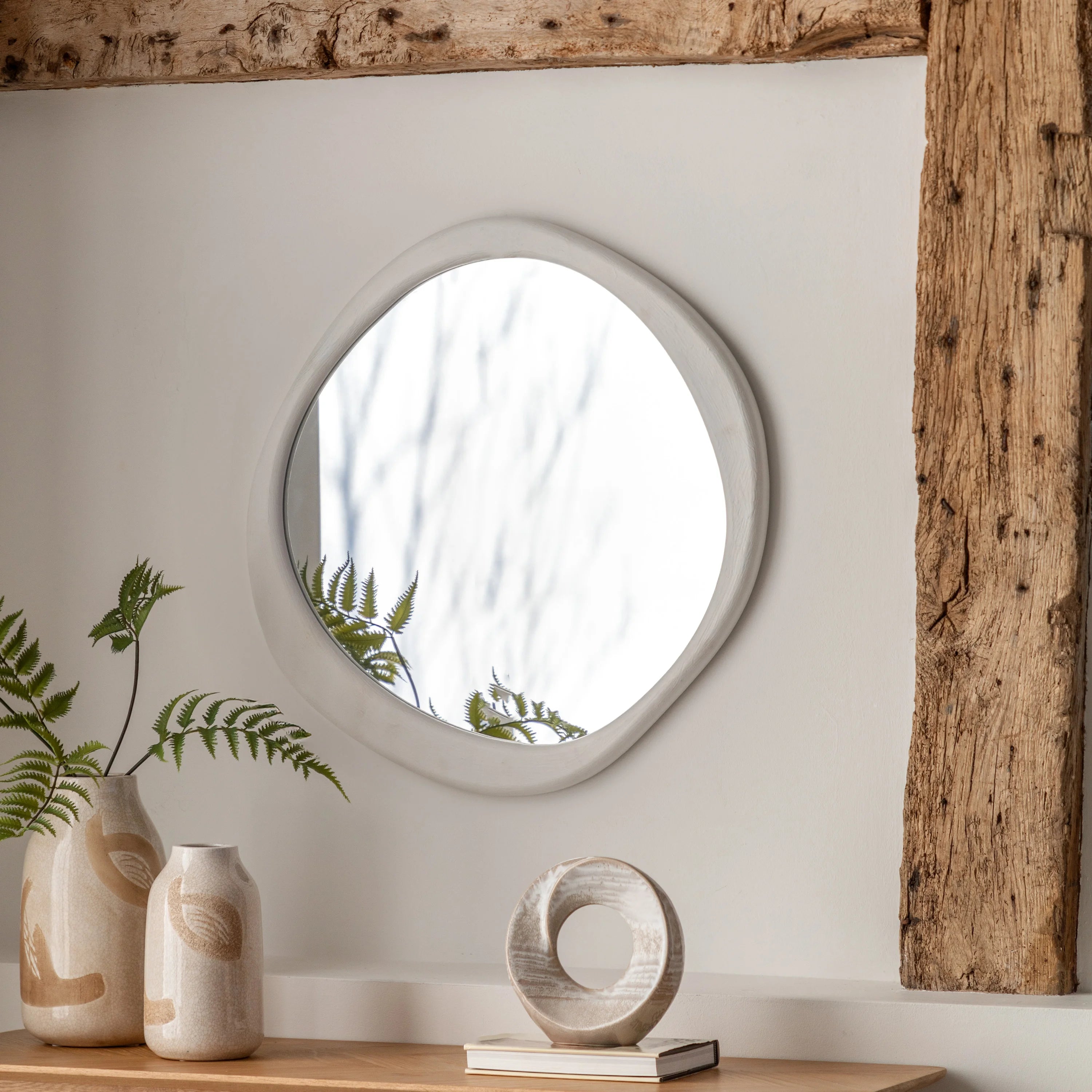 CASA Organic round wall mirror with concrete effect irregular frame