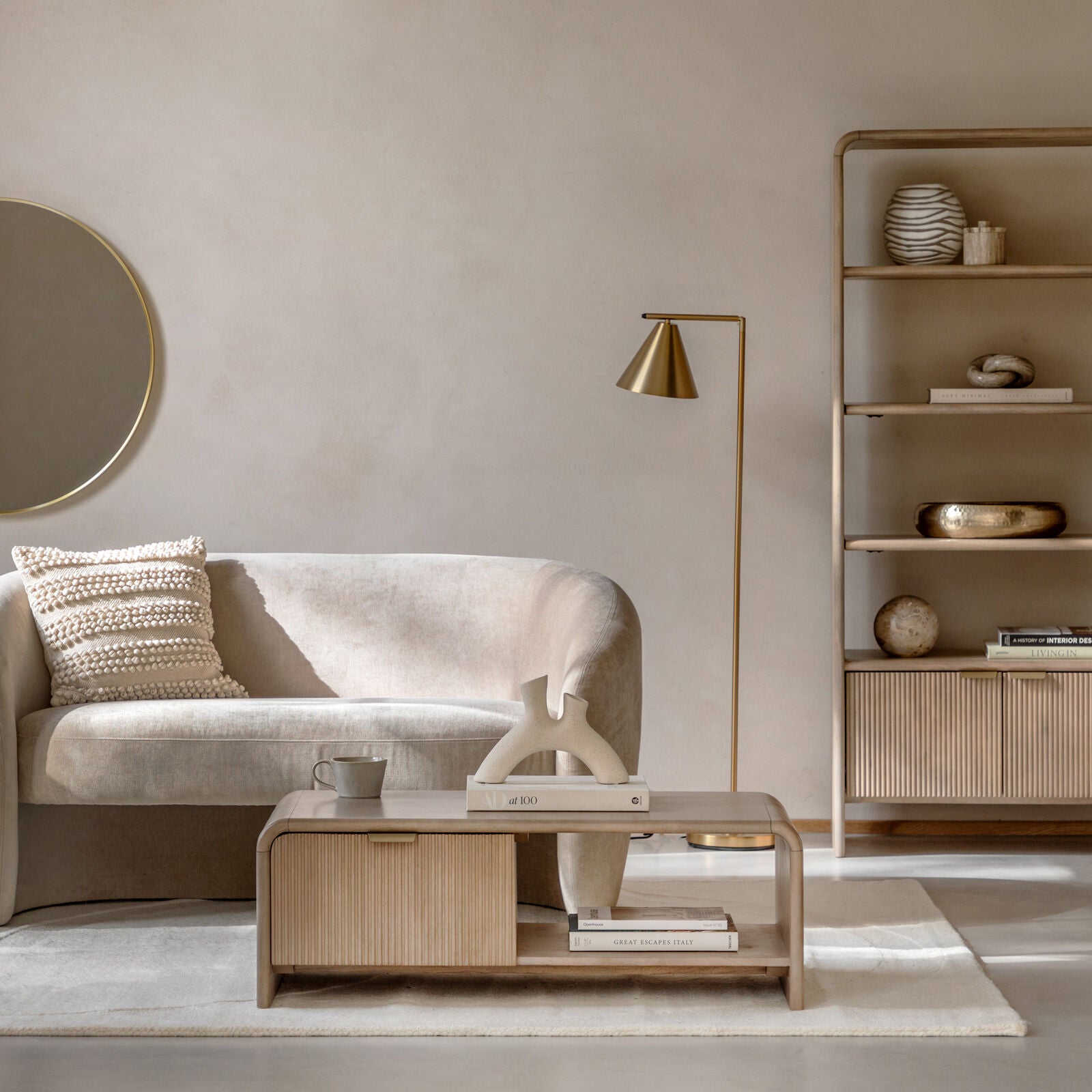 Rocca mango coffee table with curved edges, fluted drawer front and brushed brass hardware | malletandplane.com