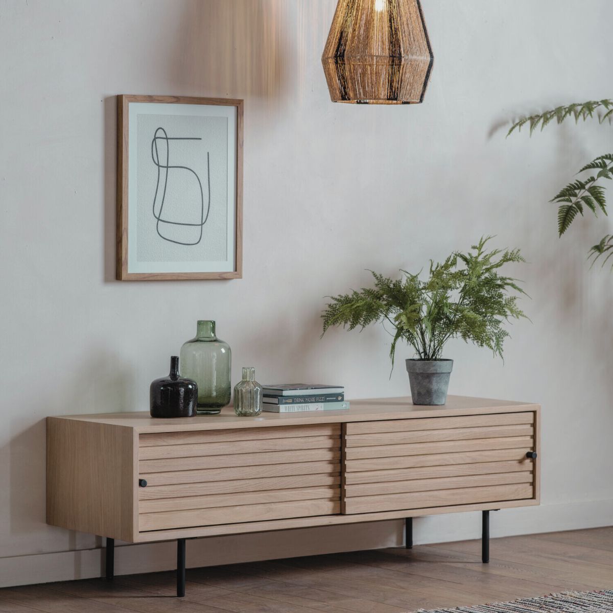 Soja oak and steel media unit with sliding doors and Japandi slatted detailing | malletandplane.com