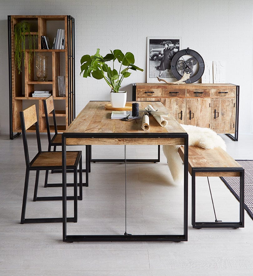 Wooden table with store metal chairs