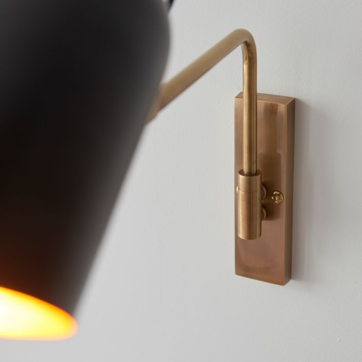 Harry adjustable antique brass and matt black wall light | MalletandPlane.com