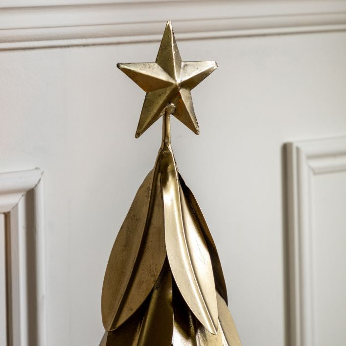 Gilded gold Christmas tree handmade from golden leaves with a gold star on top | MalletandPlane.com