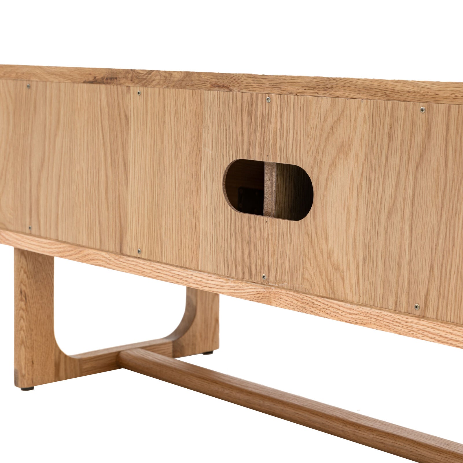 Artisan oak media unit with sliding doors and shaped underframe in natural finish | malletandplane.com