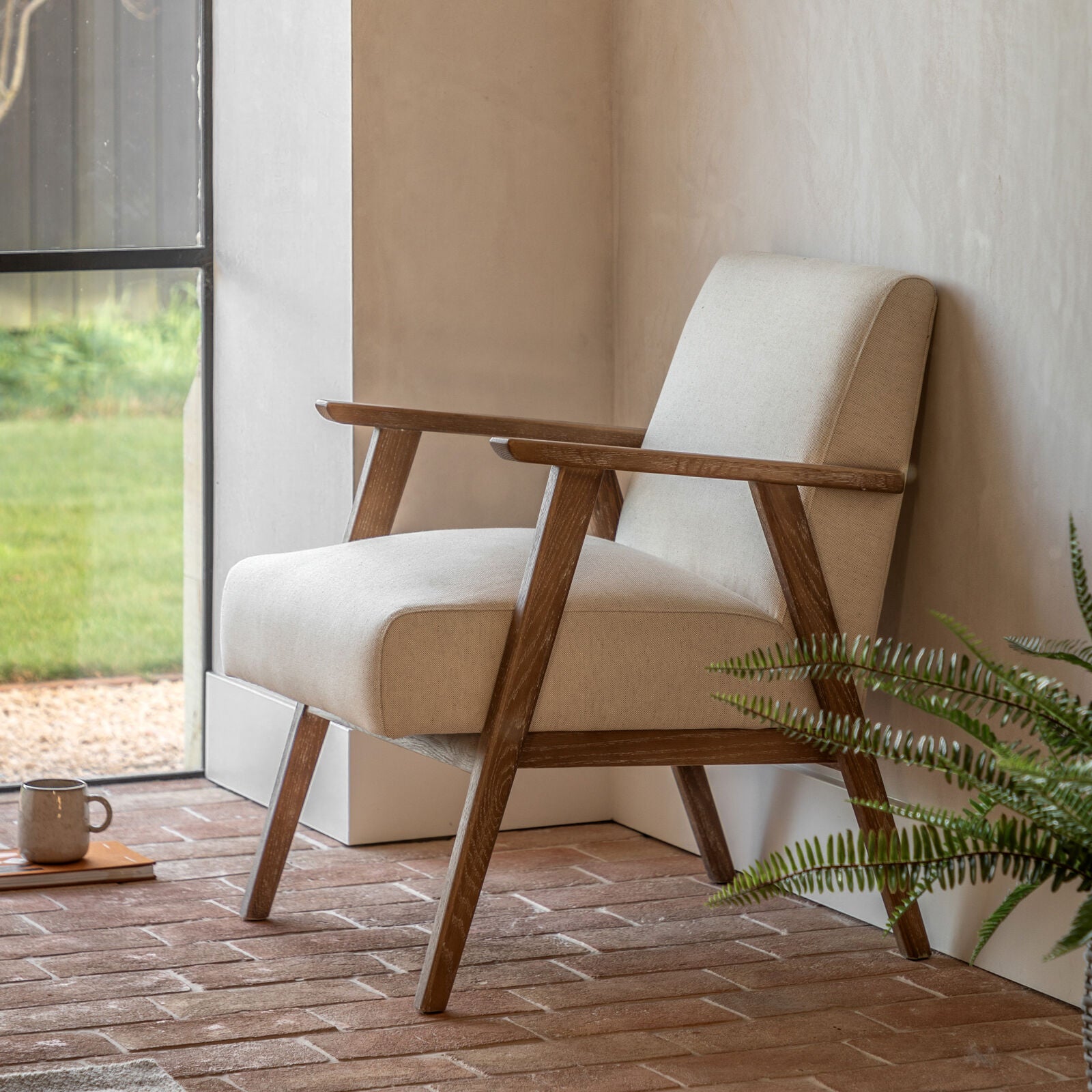 arret mid century style armchair in natural linen upholstery and solid ash wood frame | malletandplane.com