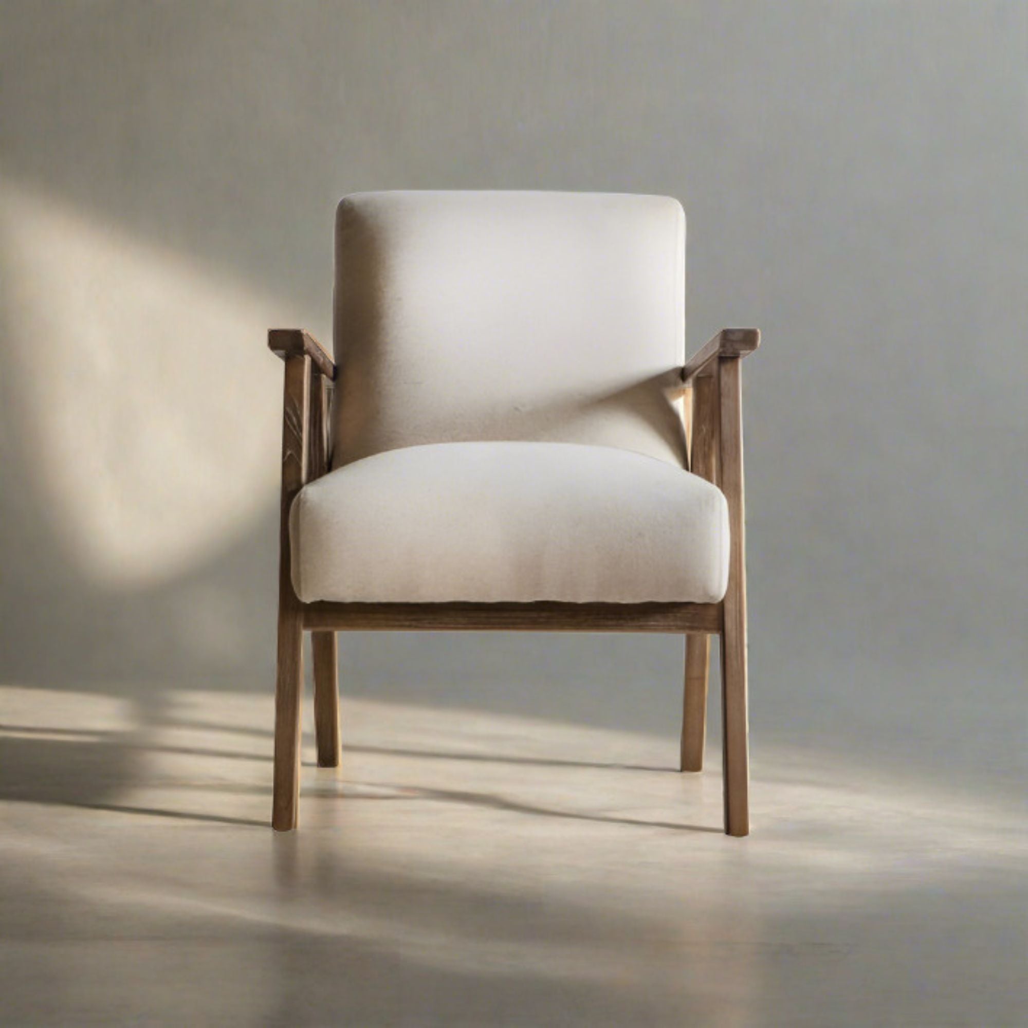 Barret mid century style armchair in natural linen upholstery and solid ash wood frame | MalletandPlane.com