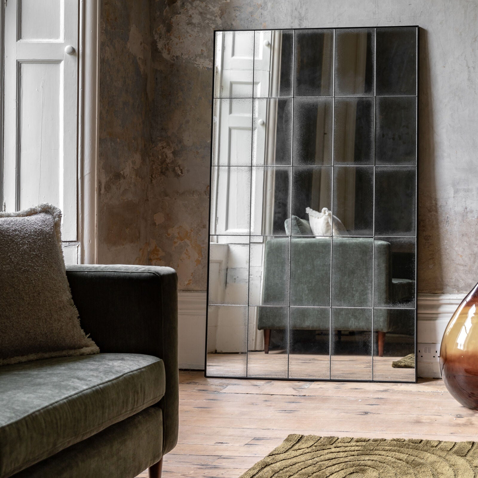 Baxter large antiqued wall mirror with 25 mirrored pieces in a structural metal outer frame | malletandplane.com