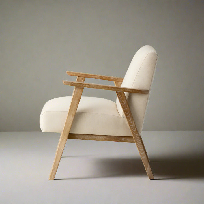 Barret mid century style armchair in natural linen upholstery and solid ash wood frame | MalletandPlane.com