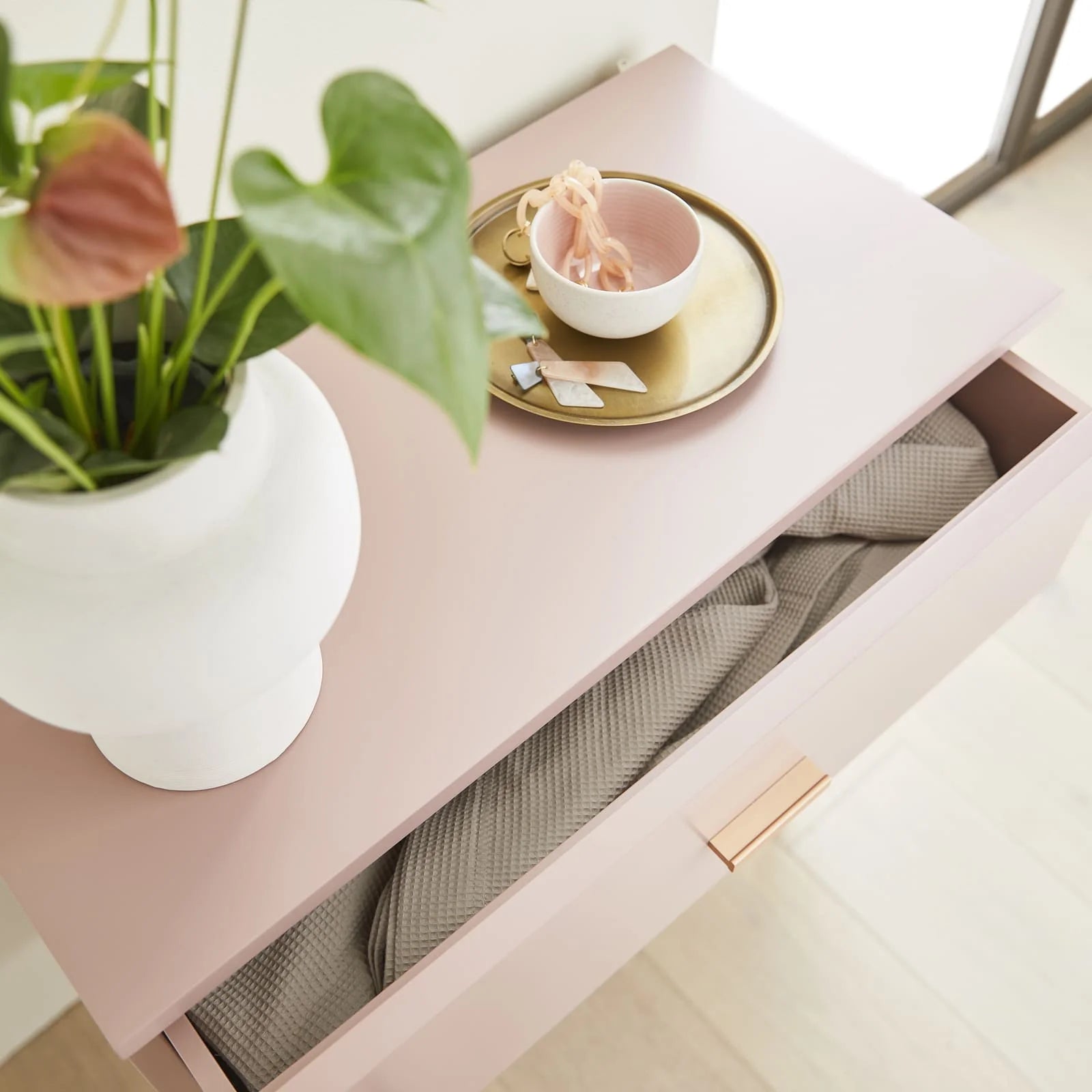 Monroe pink painted solid wood chest of drawers with metal hardware | malletandplane.com