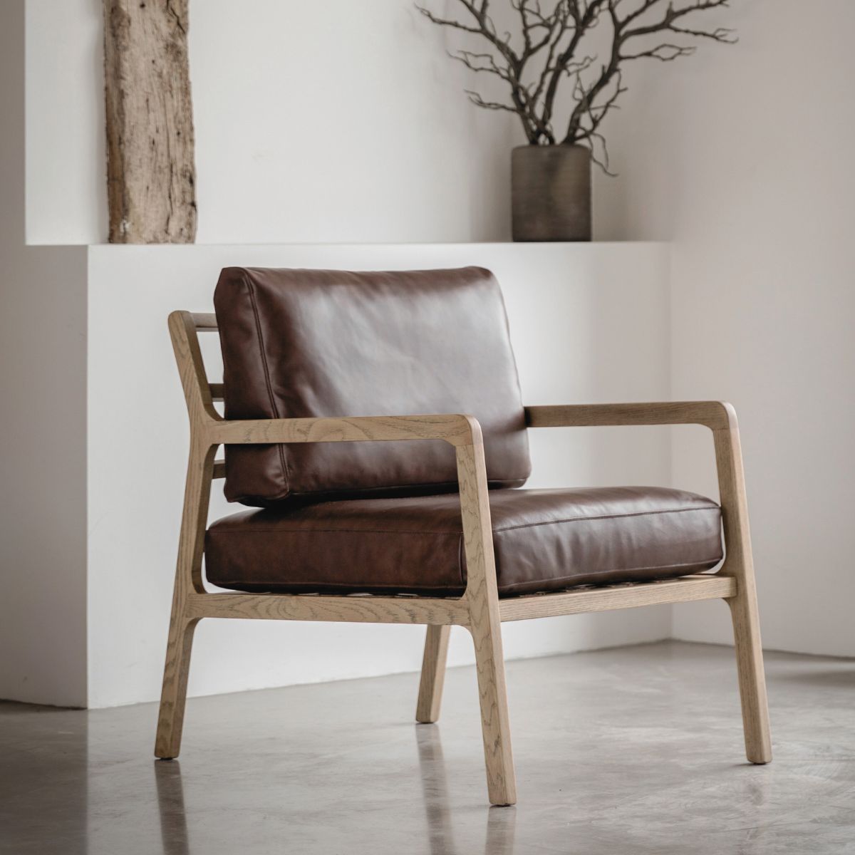 Cortona brown leather upholstered armchair with solid oak frame | malletandplane.com