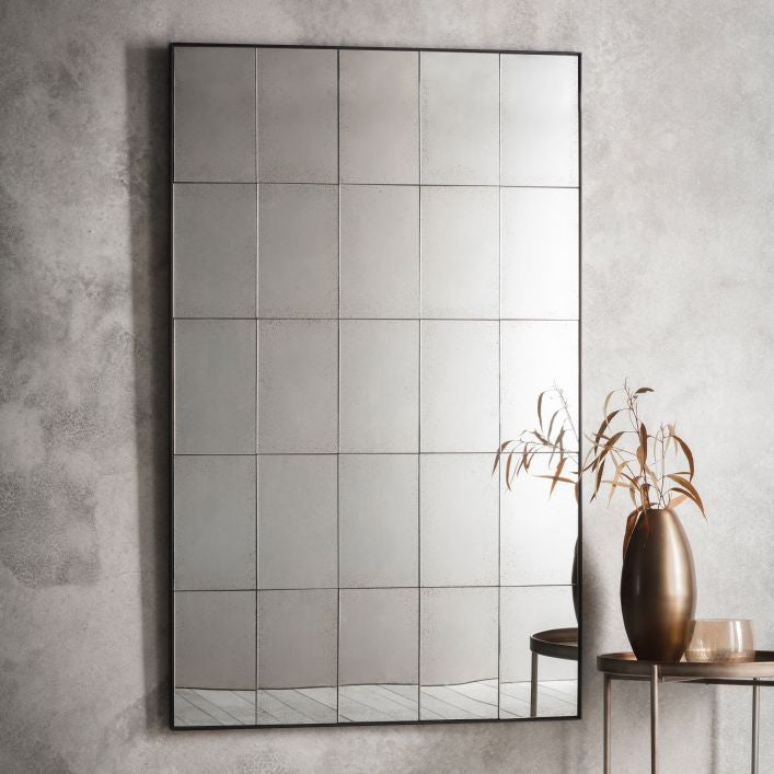 Baxter large antiqued wall mirror with 25 mirrored pieces in a structural metal outer frame | malletandplane.com