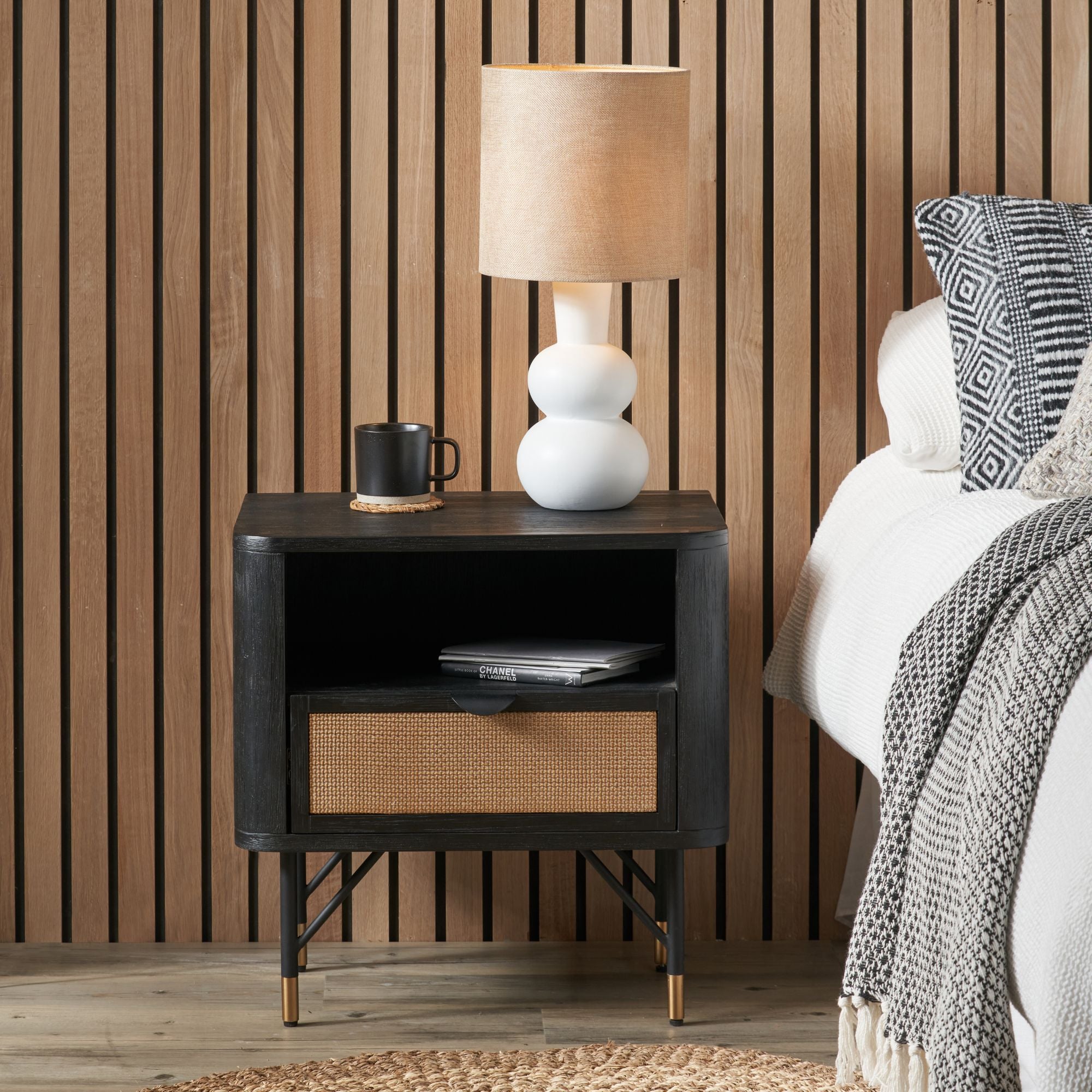 Ersta black acacia wood and natural rattan bedside table with 1 x drawer and open niche | malletandplane.com