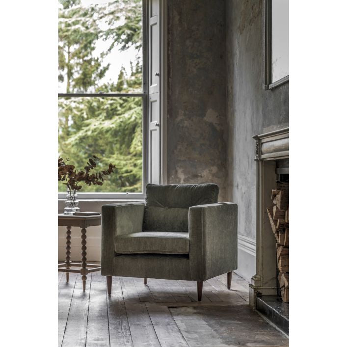 Chelsea contemporary armchair in a choice of 3 colours with elegant tapered wooden feet | malletandplane.com