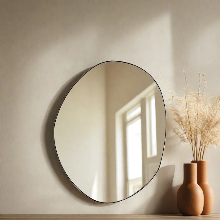Cornelia medium organic wall mirror with black frame | malletandplane.com