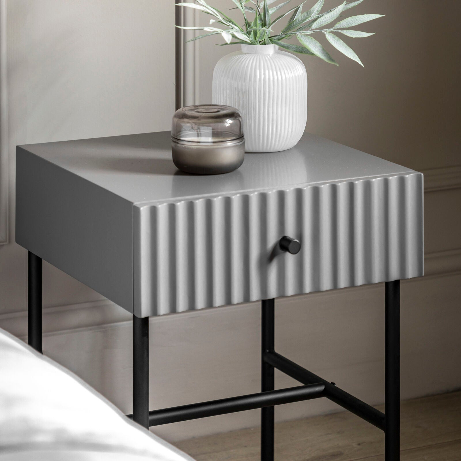 Flute bedside table with drawer in grey finish with scalloped fascia and black metal underframe | malletandplane.com