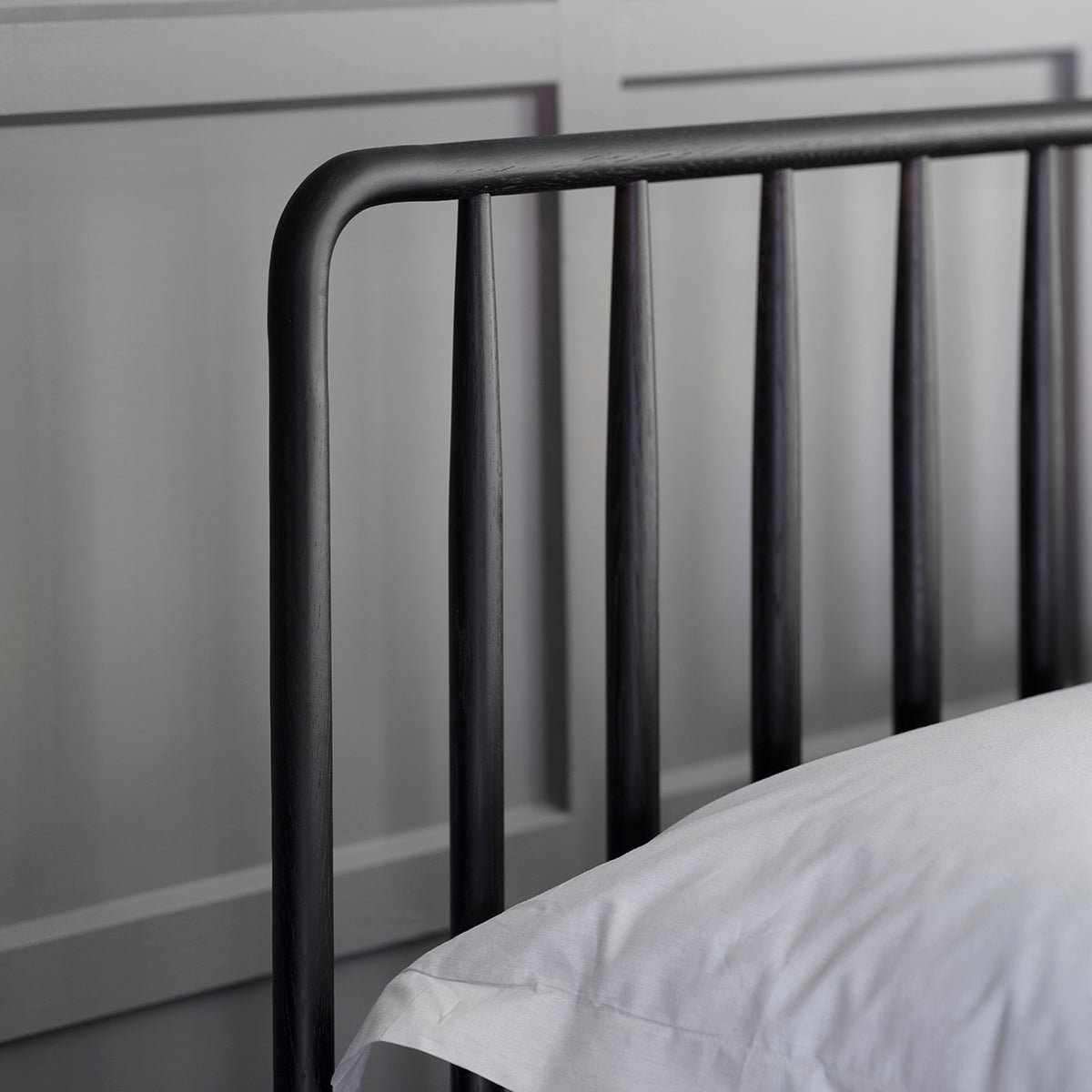 Axel black oak double bed with spindle details in cernacular style | malletandplane.com