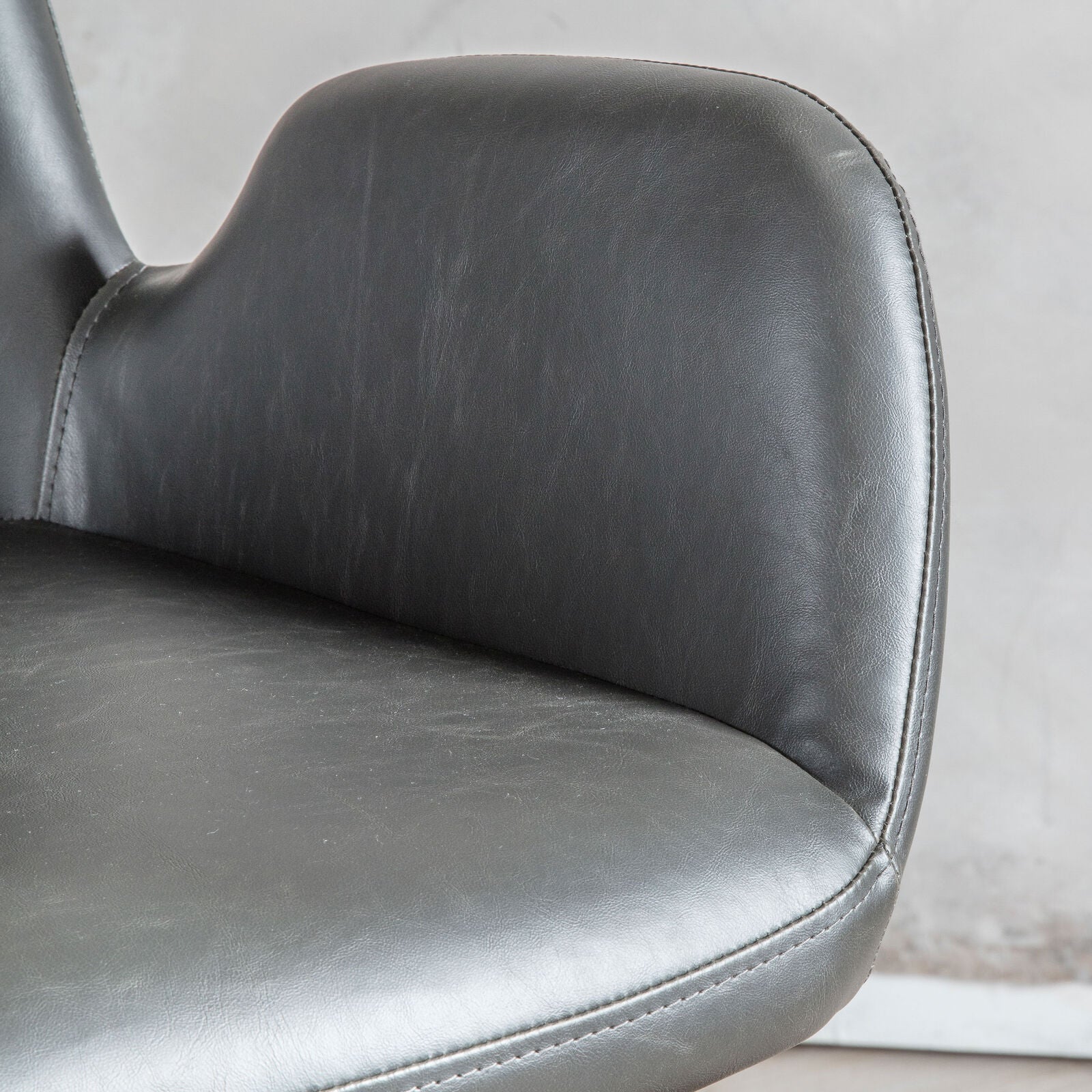 Dawson charcoal faux leather adjustable swivel chair | malletandplane.com
