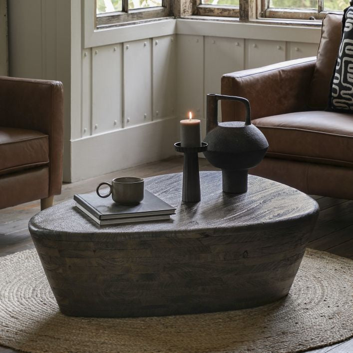 Jake triangle shaped mango wood coffee table in dark wood finish | malletandplane.com