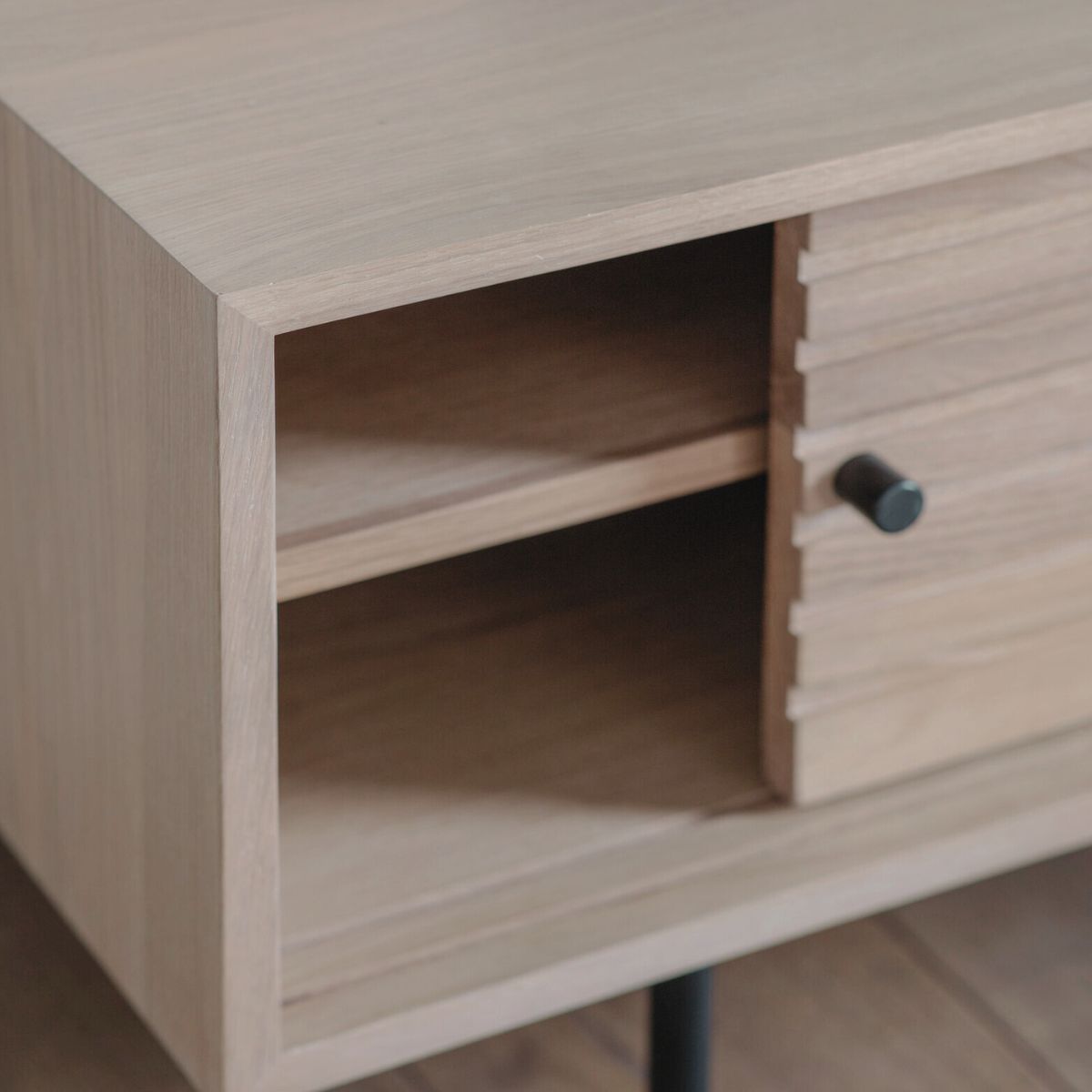 Kori oak and steel media unit with sliding doors and Japandi slatted detailing | malletandplane.com