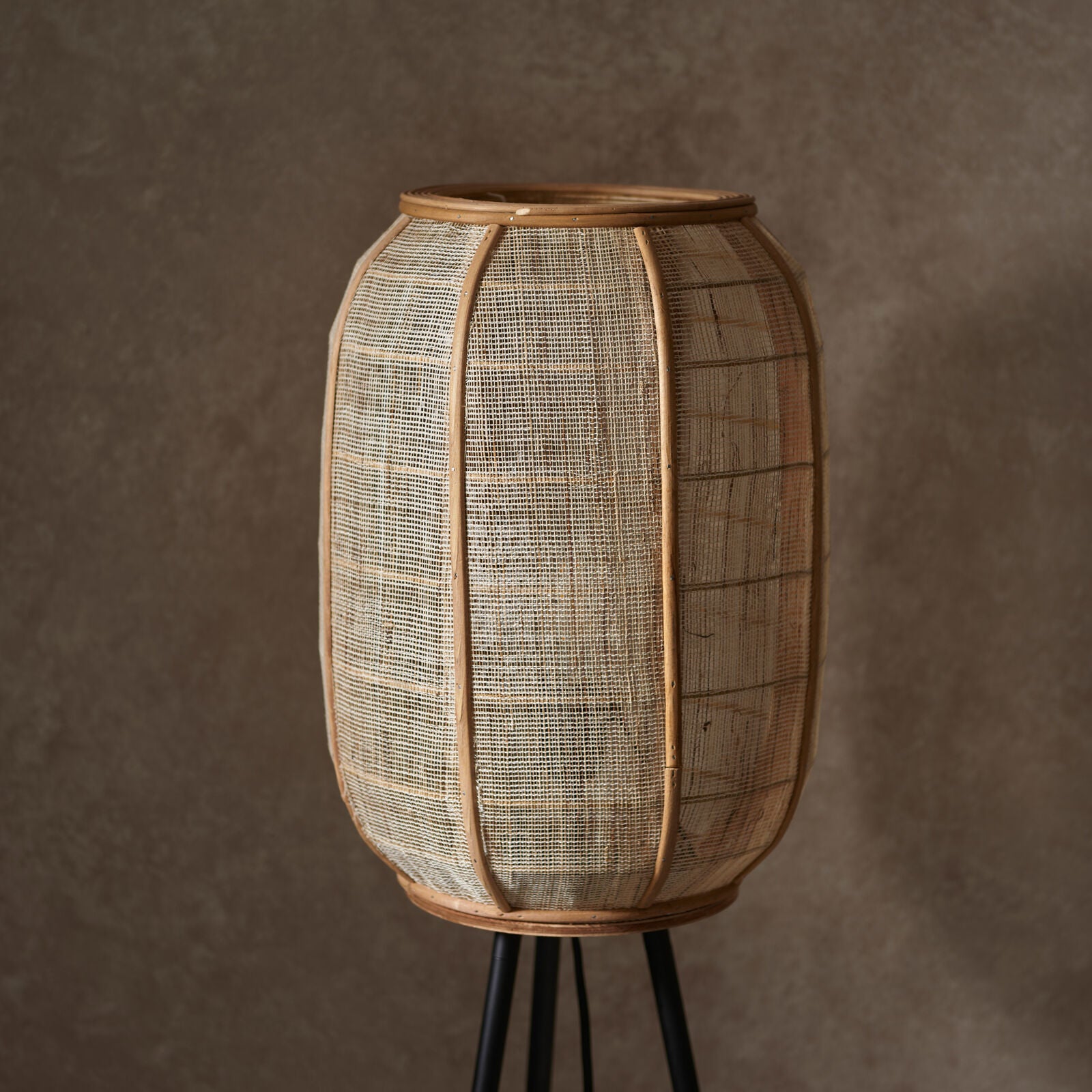 Bonobo tripod floor lamp with black legs and natural linen shade | malletandplane.com