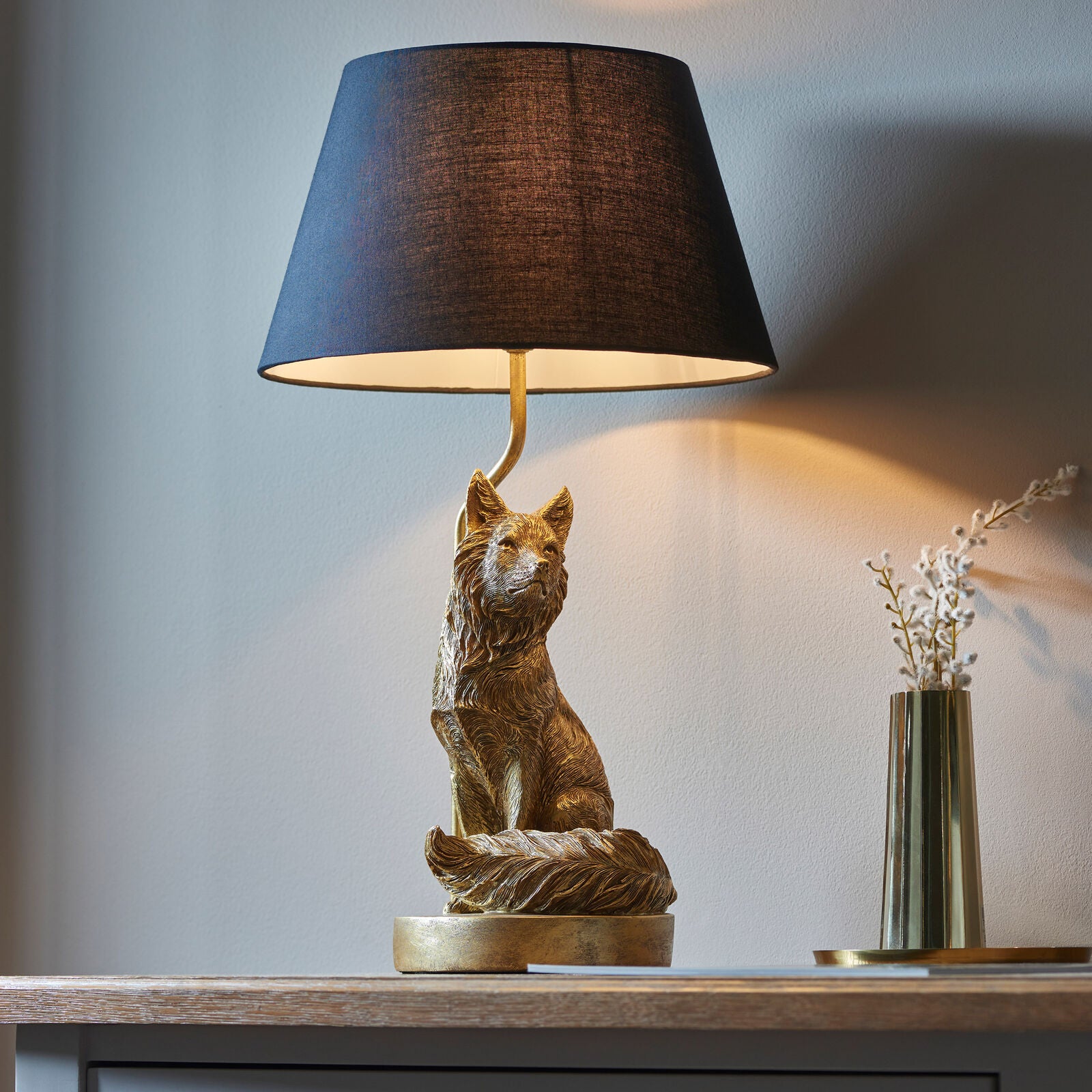 Basil Fox table lamp in vintage gold finish with black fabric shade | malletandplane.com