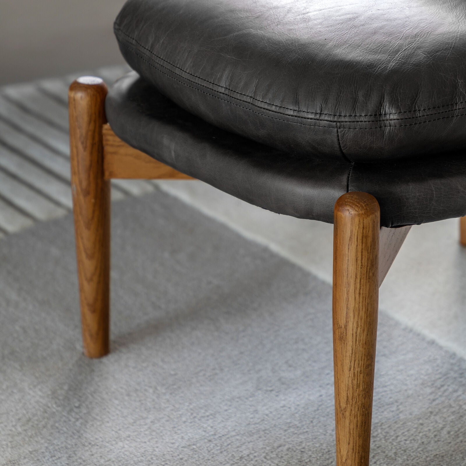 MARCUS Antique Ebony Leather Footstool | malletandplane.com