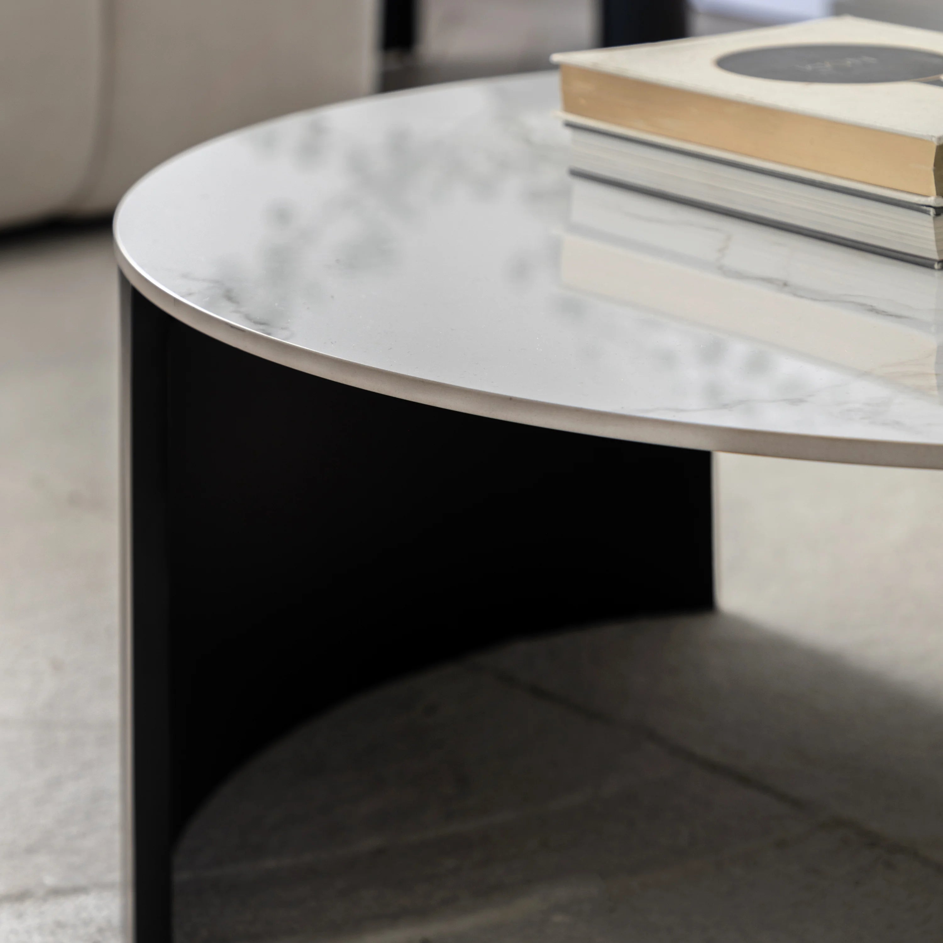 MARZIO Round Coffee Table – Stone Top & Black Base