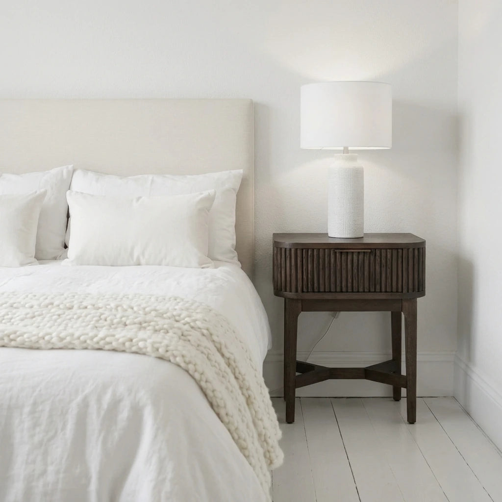RAIE walnut finished bedside table with ribbed styling and 1 drawer