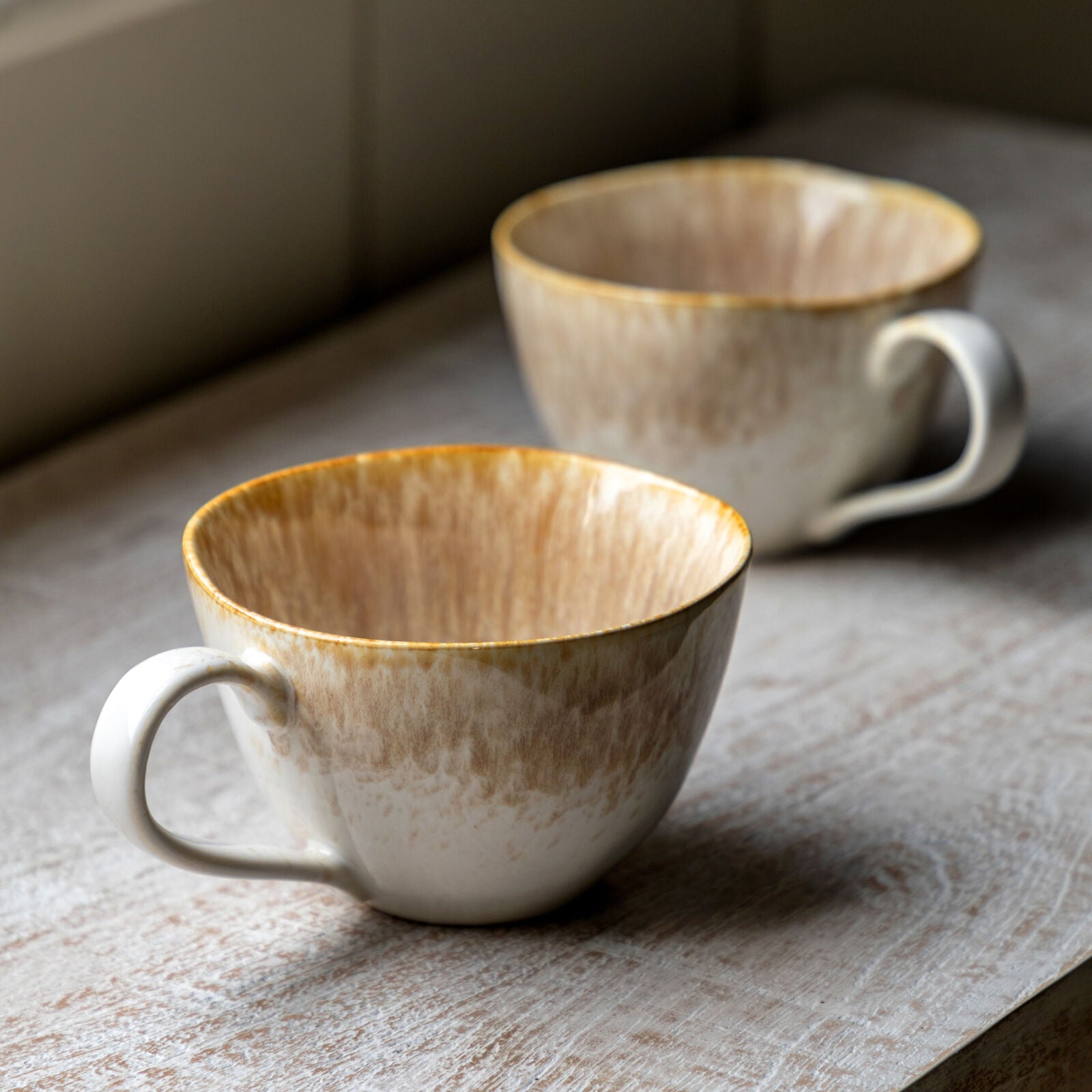 Reactive glaze set of 4 camel coloured ceramic mugs | malletandplane.com