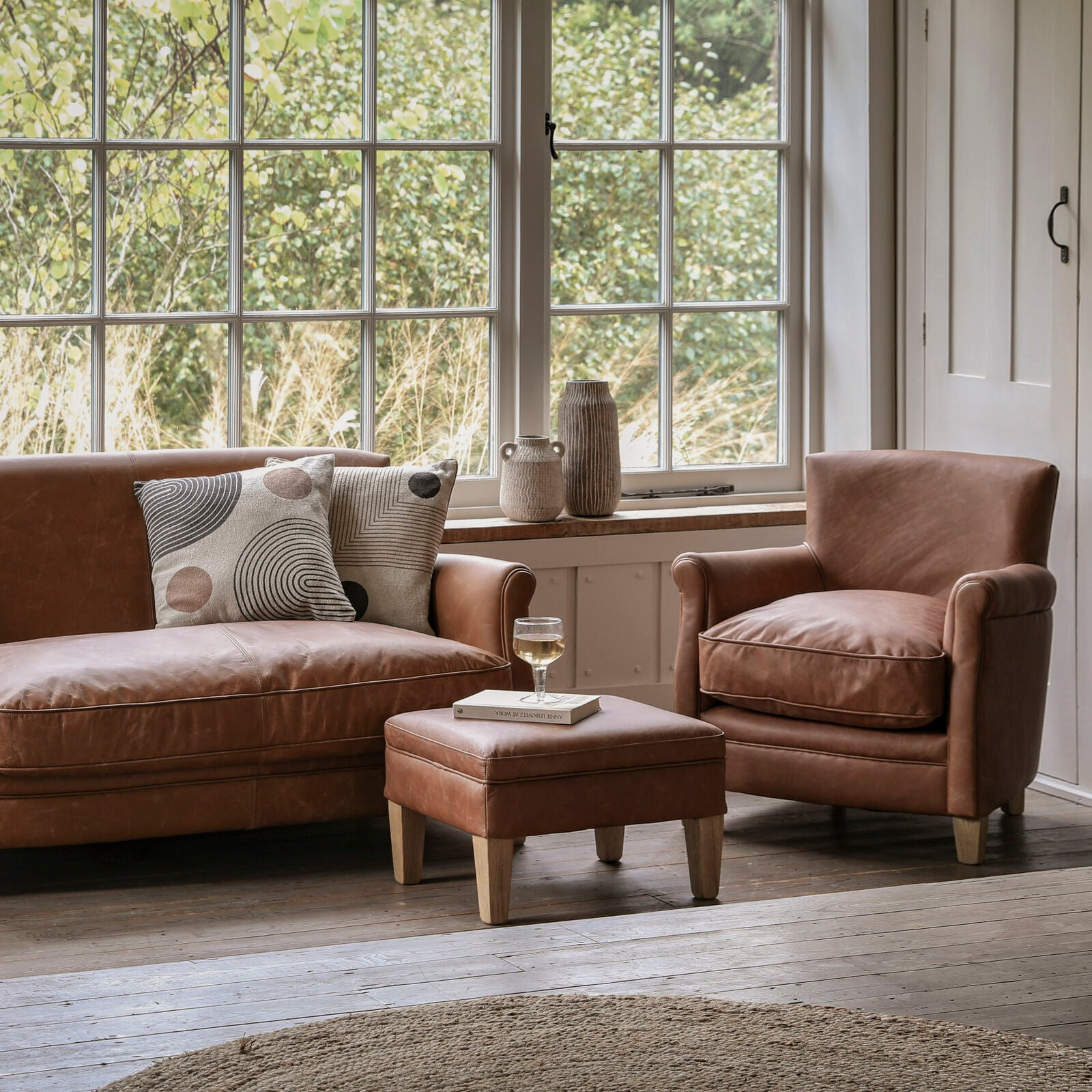 Sir Alfred vintage brown top grain leather footstool with solid ash legs | malletandplane.com