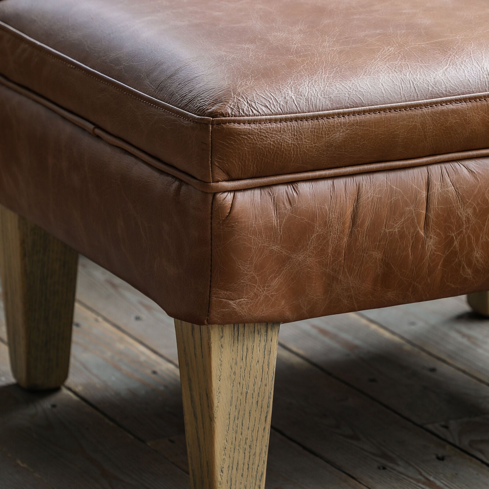 Sir Alfred vintage brown top grain leather footstool with solid ash legs | malletandplane.com