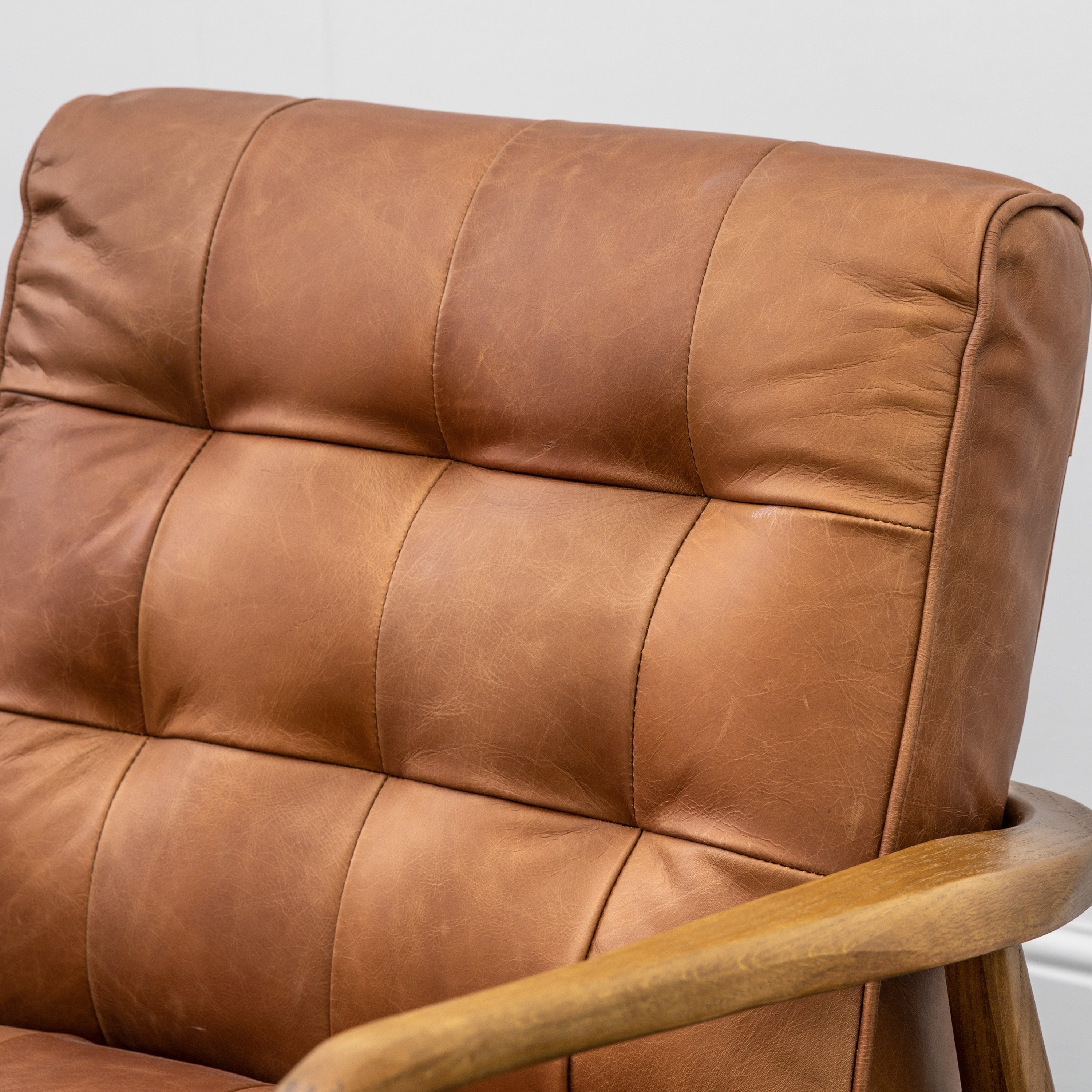 Tufted leather deals accent chair