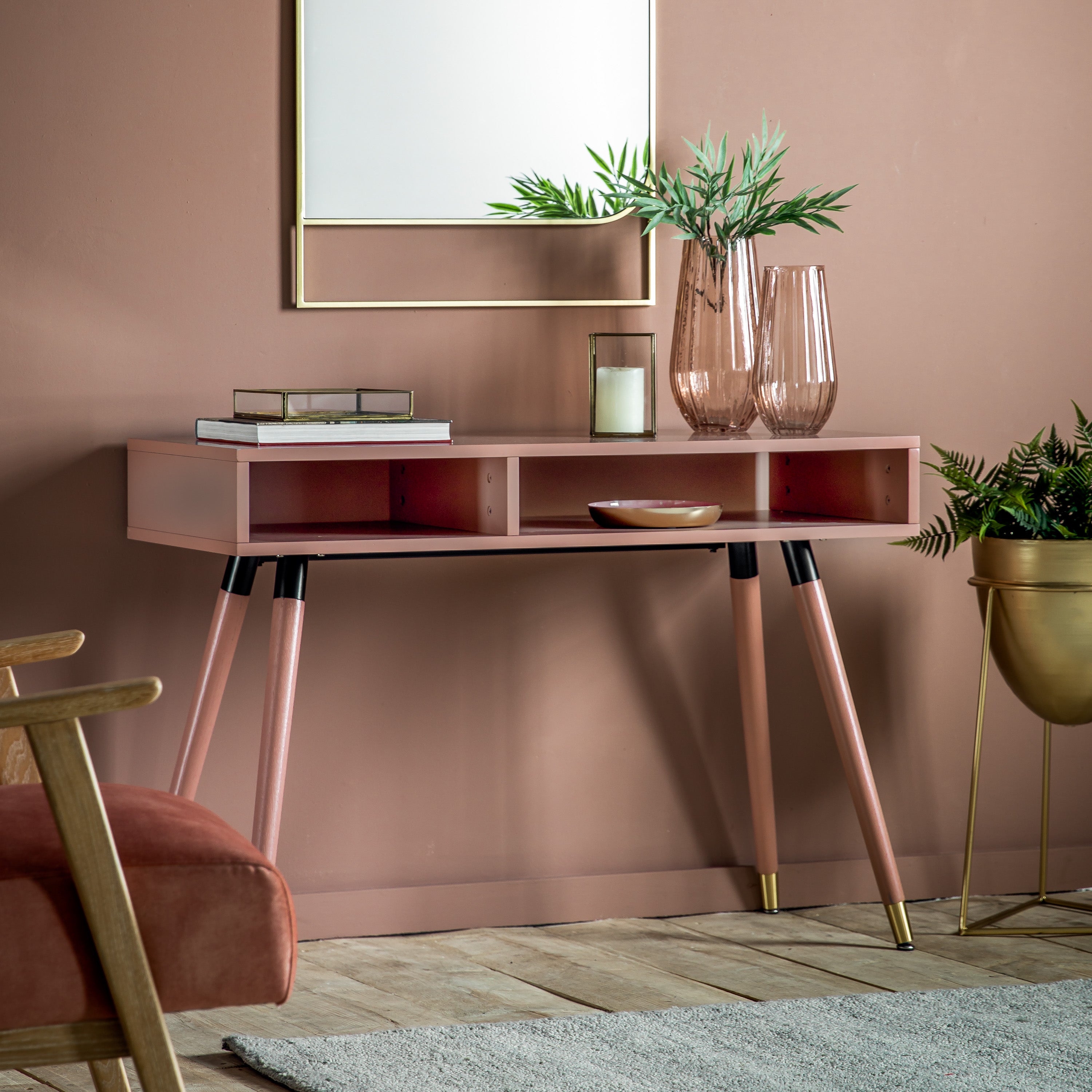 Evissa pink console table with brass socks and adjustable feet | malletandplane.com