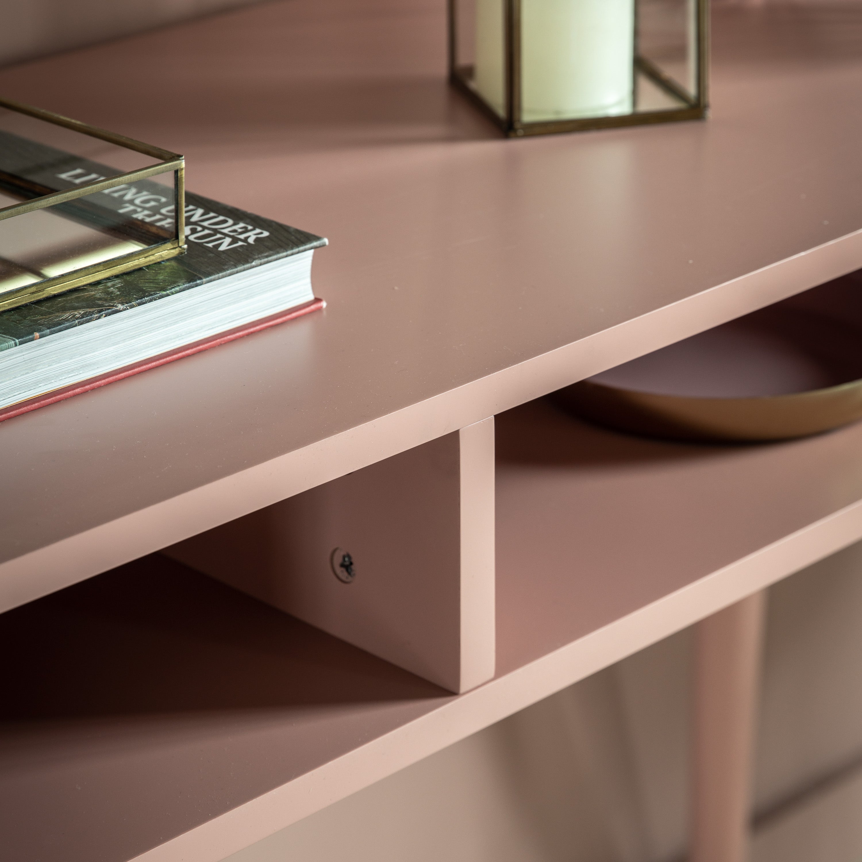 Evissa pink console table with brass socks and adjustable feet | malletandplane.com
