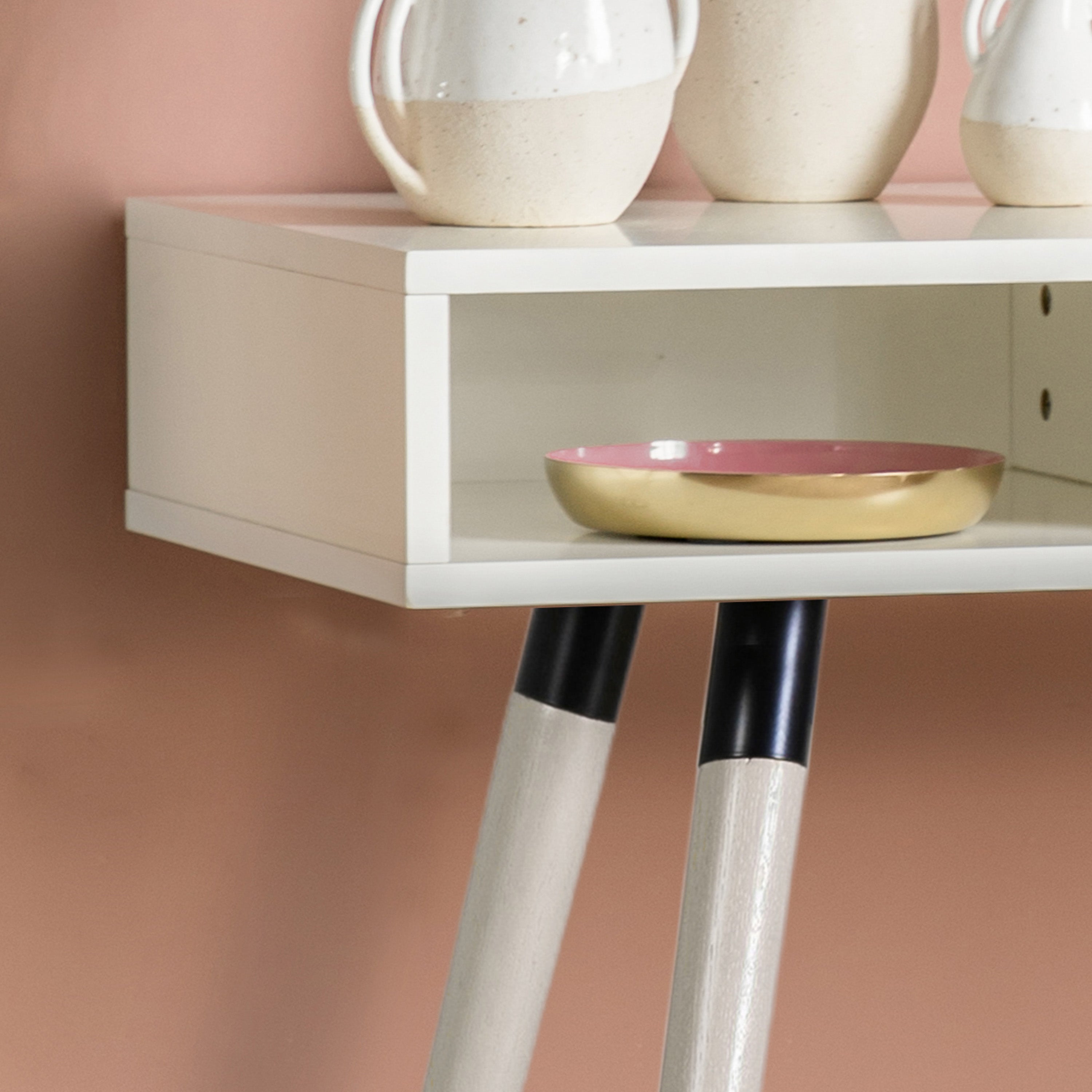 Evissa white console table with brass socks and adjustable feet | malletandplane.com